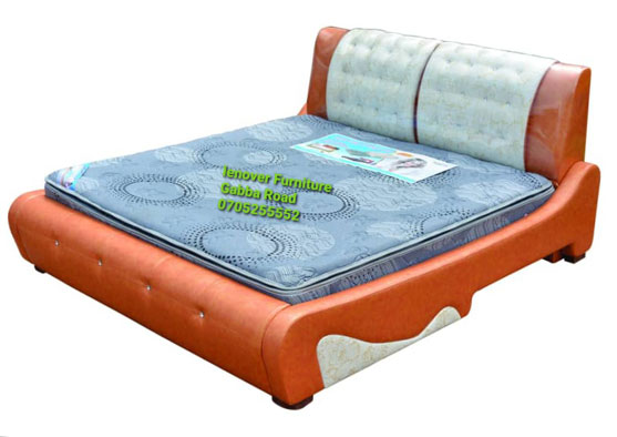 L9 king size Bed with a pillow top spring mattress.
